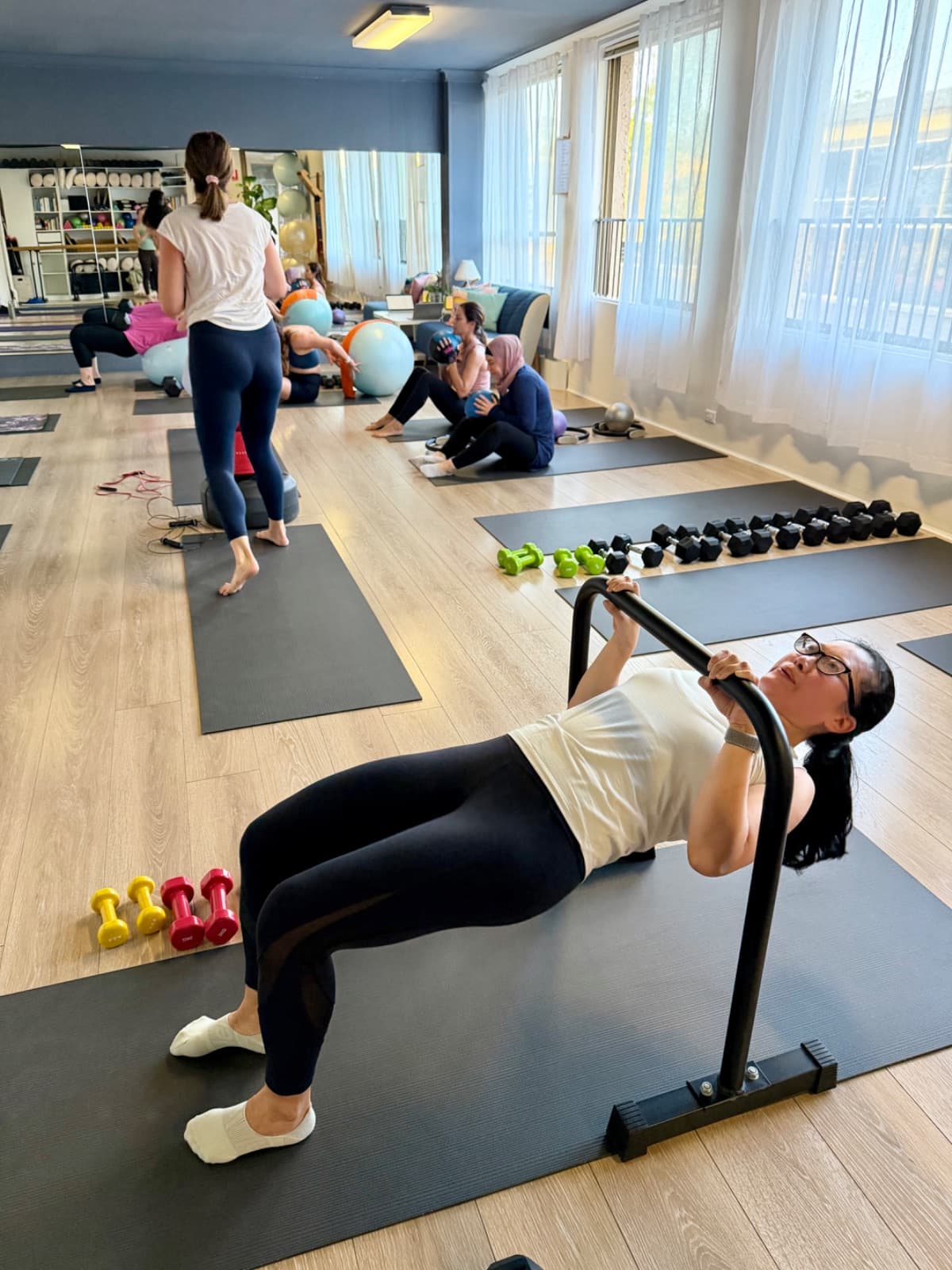 Group power circuit workout with mixed cardio and strength stations