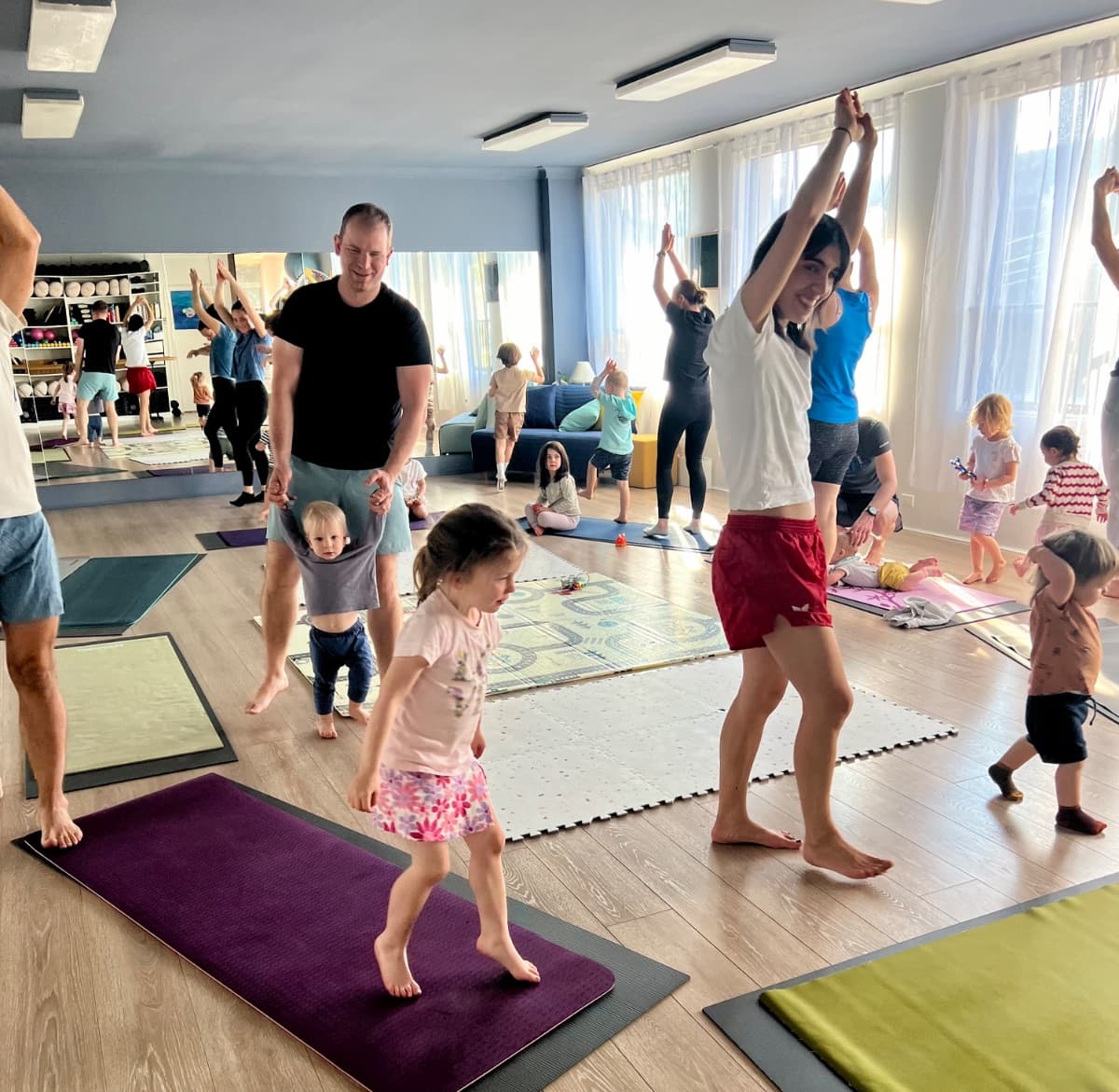 Family yoga class for parents and kids at Evolvere Lane Cove